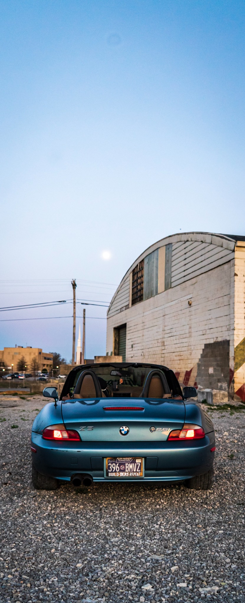 BMW Z3 roadster photographed in an industrial setting