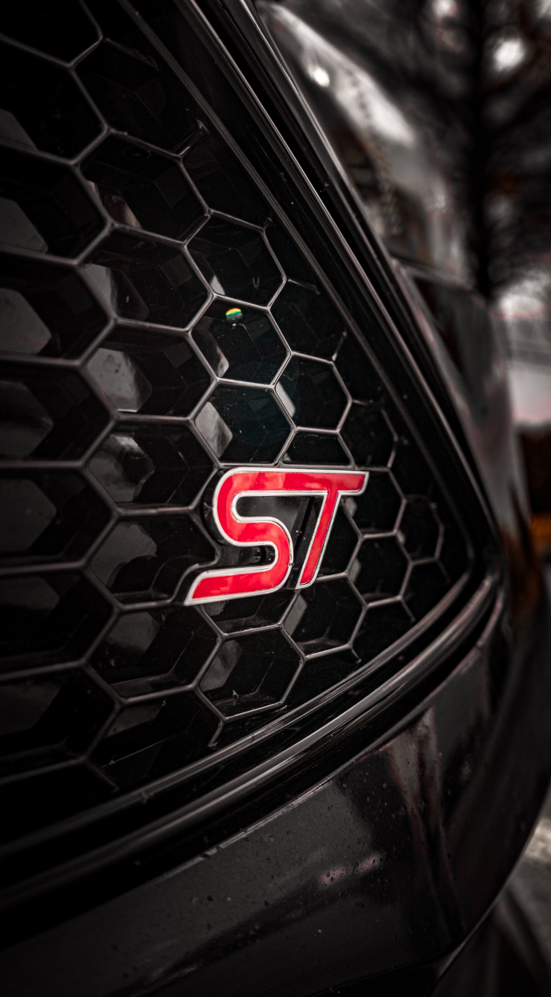 Close-up of a Ford Focus ST grille badge